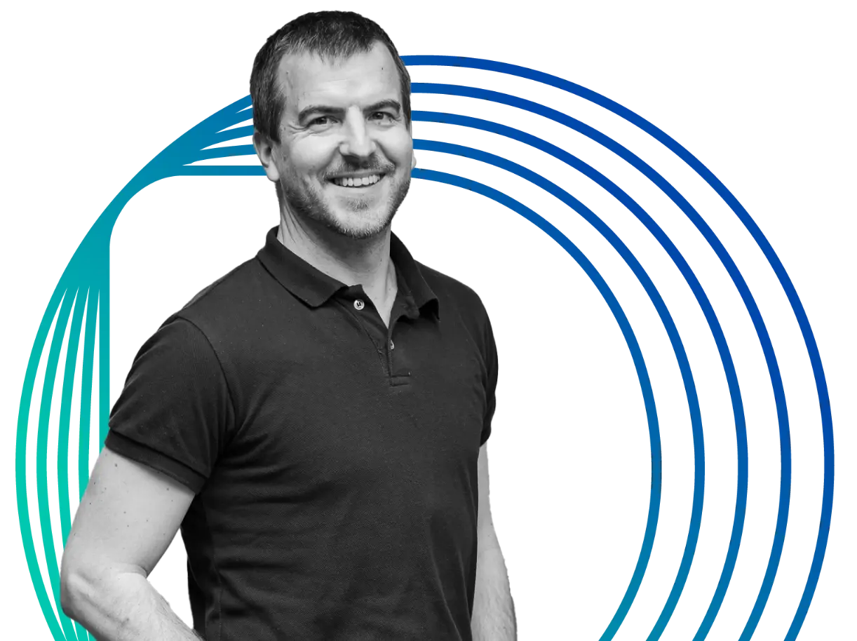 man smiling with an circular background